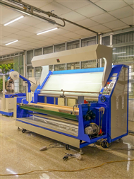 Máy kiểm tra vải, xả vải có định biên mép vải